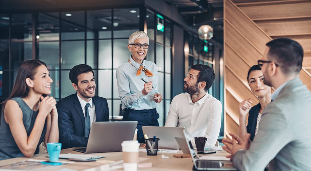 Regulatory conversations - Colleagues in a meeting